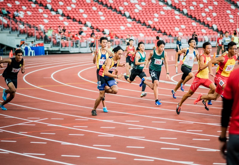 Atheletes running on the track (Credits: Jonathan Chng)